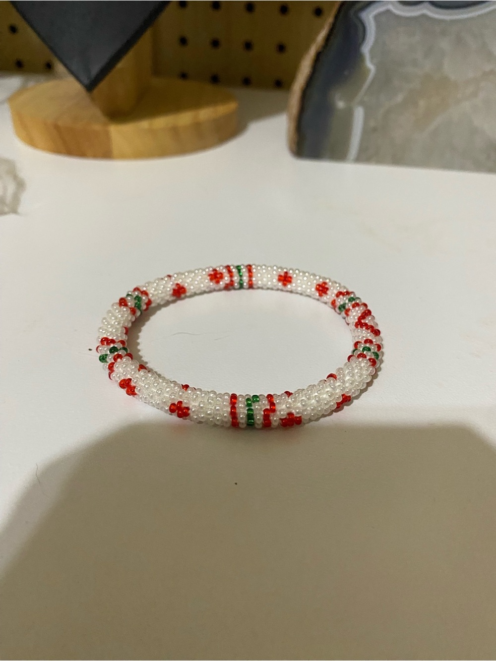 Festive White Beaded Bracelet with Red and Green Accents